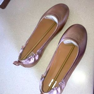 Rose Gold ballerina style flats size 7 1/2 Brand new! Never worn.